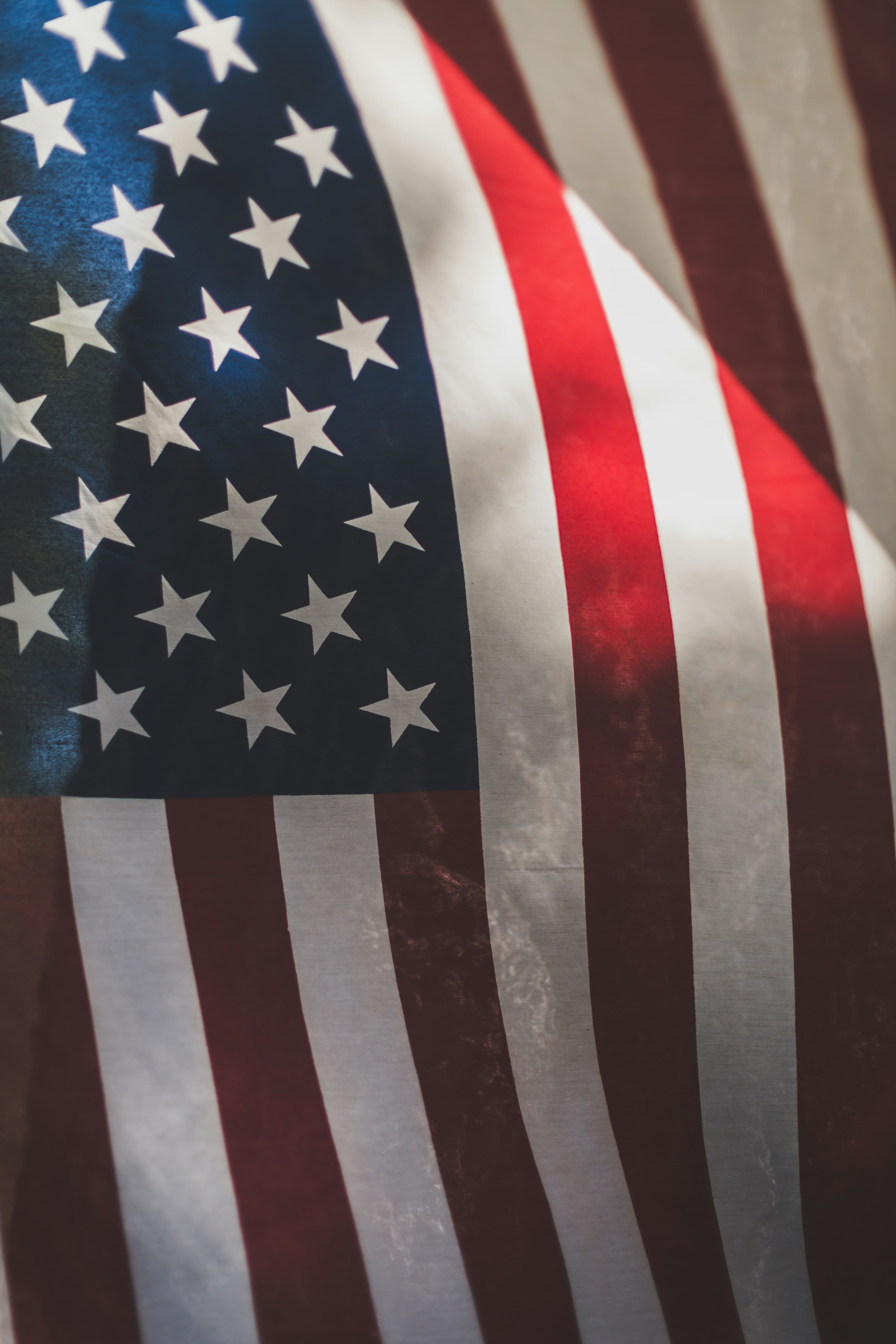American flag background representing US-based call center services across multiple industries